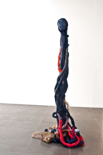 Oneself, 2012. White pencil, acrylic, papier-mâché, fabric, stones. 73x36x27 in - 186x92x68.5 cm 