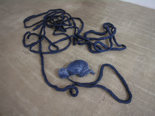 Sulla curva del giorno, 2007. White pencil, acrylic, fabric, papier-mâché. 8x79x95 in - 20x200x240 cm 